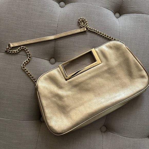 Michael Kors Gold Clutch with Strap. - Picture 2 of 2